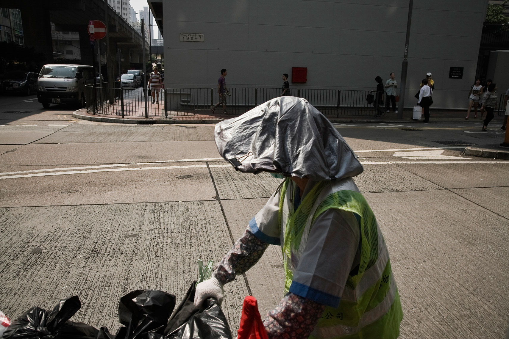 CHINA. Hong Kong, October 2012.  A street sweeper.